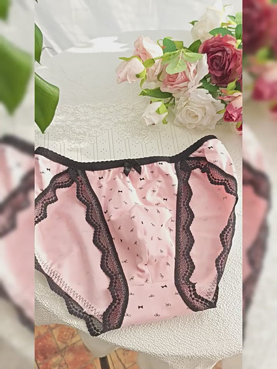 pink bow print cotton femboy pouch panties for men product video showing black lace trim and double layer front panel